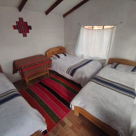Inti Wasi Lodge Comunidad Yumani Buitenkant foto