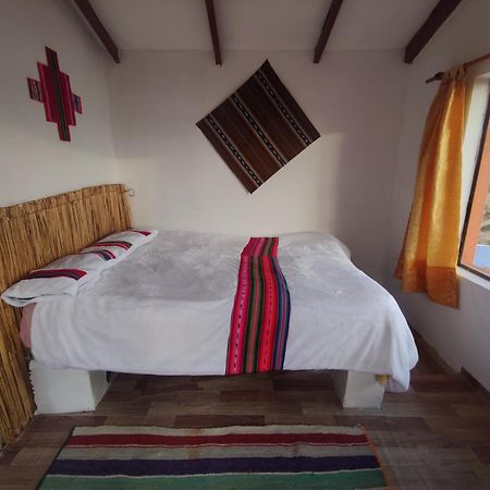 Inti Wasi Lodge Comunidad Yumani Buitenkant foto